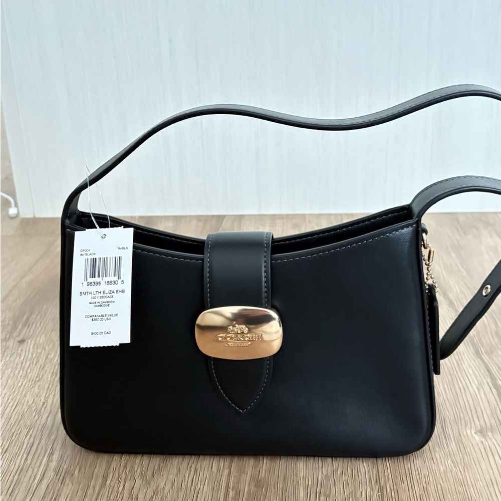 Coach- Black Eliza Shoulder Bag With Gold accents and zipper